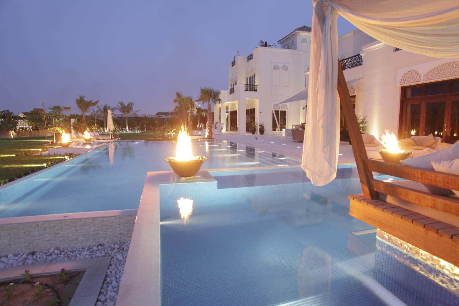 Home Automation For Large Homes Swimming Pool with Raised Seating 1 - Home Automation For Large Homes