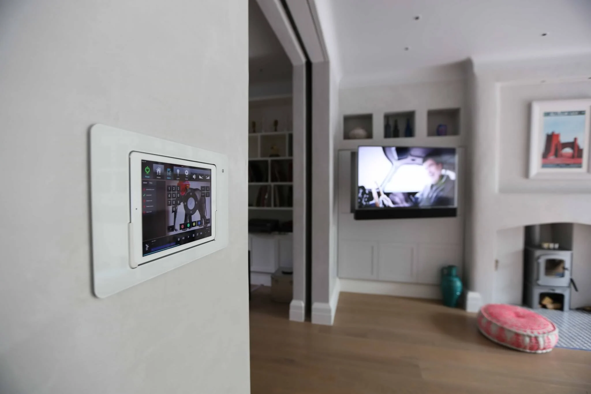 Hampstead music industry home with an in-wall Crestron touchpanel, London