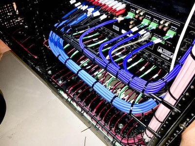AV rack after Custom Controls system takeover and renovation